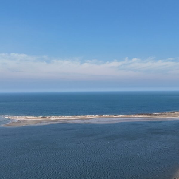 http://Coastal%20scene%20with%20the%20ocean%20in%20the%20background.